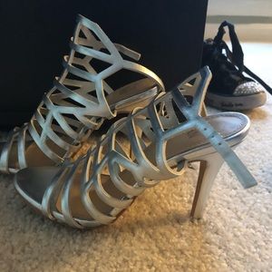 Size six silver metallic strap pumps